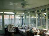 A screen room with storm windows.